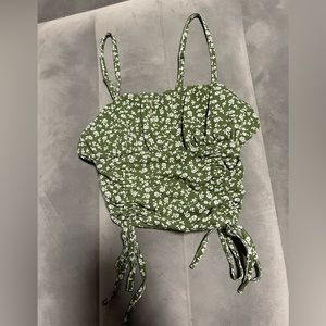 Green crop top with white flowers